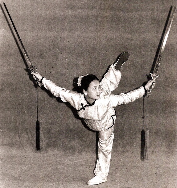 A person holding a bow and arrow
Description automatically generated with low confidence