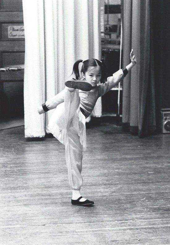 A person dancing in a room
Description automatically generated with medium confidence